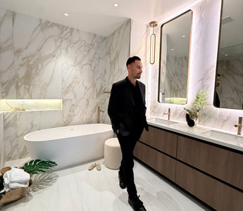 Victor Salazar touring a luxury pre-construction interior in Miami, pre-construction financing