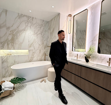 Victor Salazar touring a luxury pre-construction interior in Miami, pre-construction financing